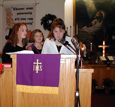 Three girls at the pulpit