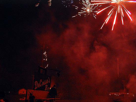 Fireworks in front of DeCosse sign.